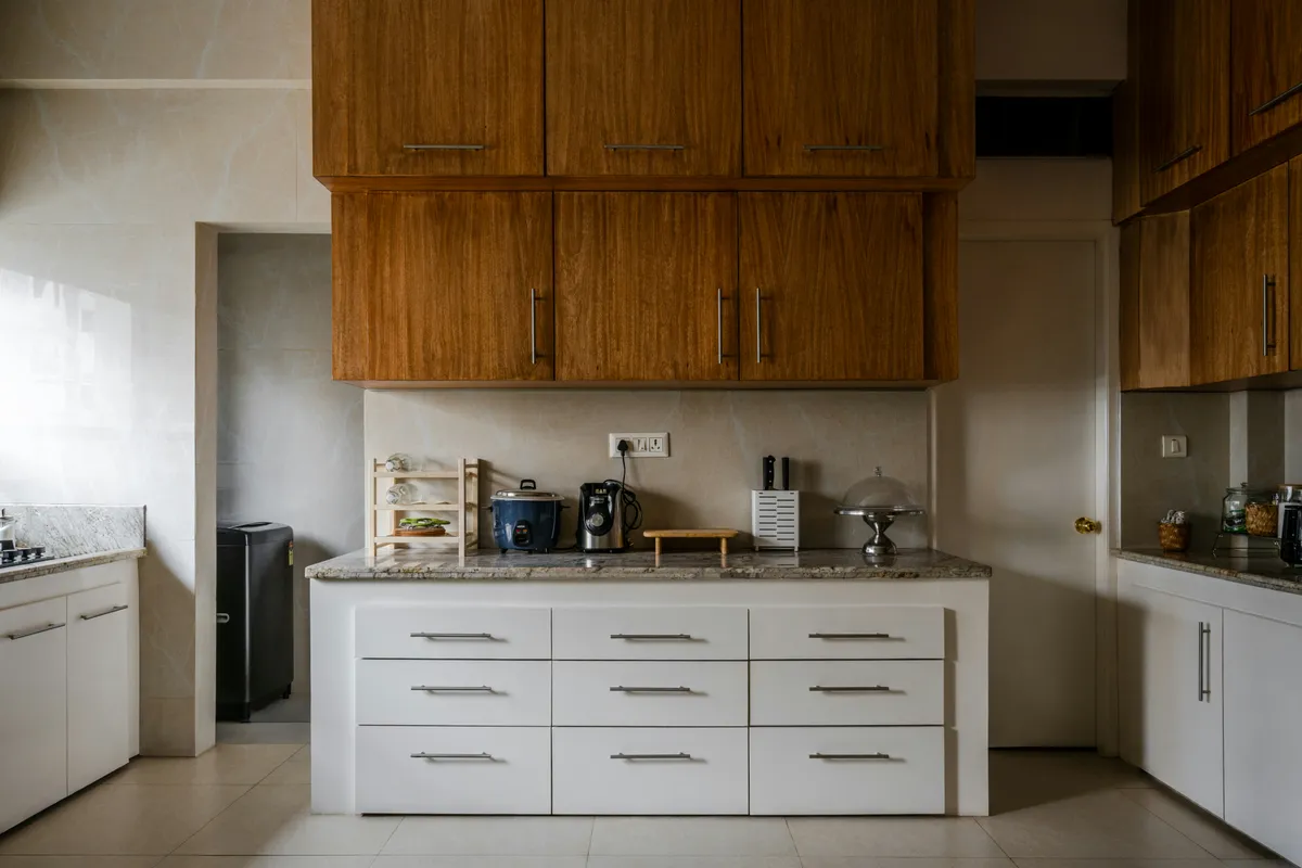 Kitchen run with long counters and flush fitted cabinet fronts
